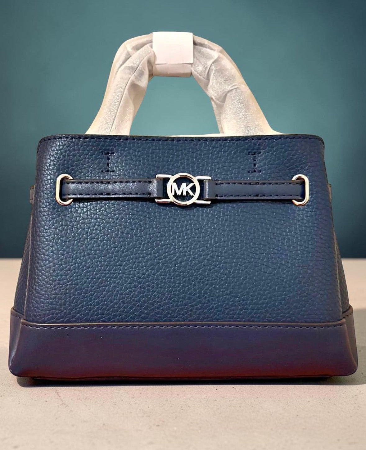 MICHAEL KORS REED Borsa mini a mano, in pelle